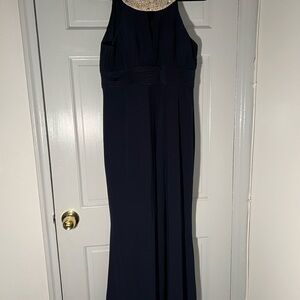 Navy blue dress with lace detailing on the neckline
